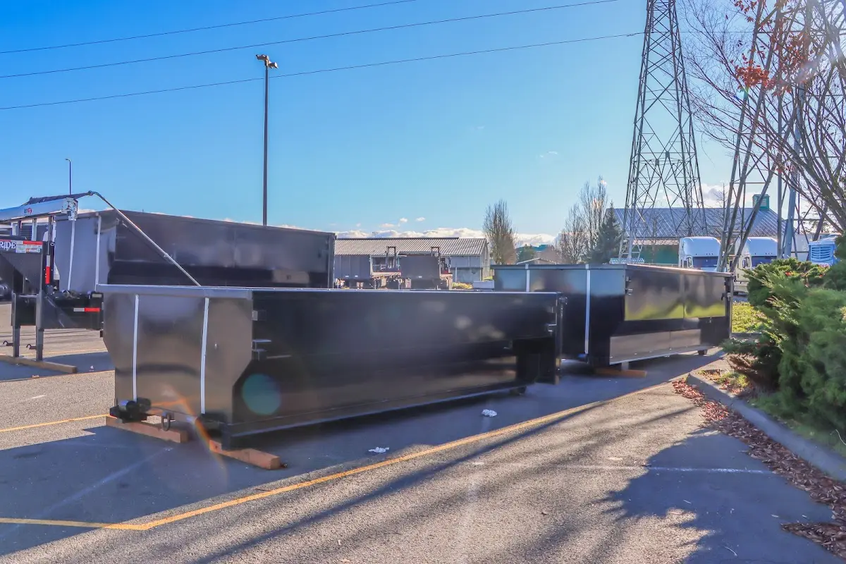 Roll-off dumpster ready for waste disposal at job site for 12 Yard Dumpster Rental in Clinton